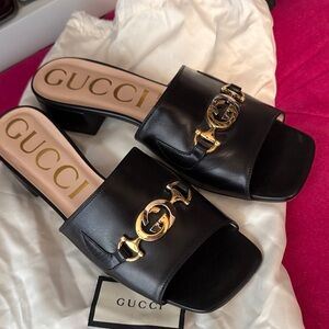 Gucci Women's Black Leather Mules with Gold Accent